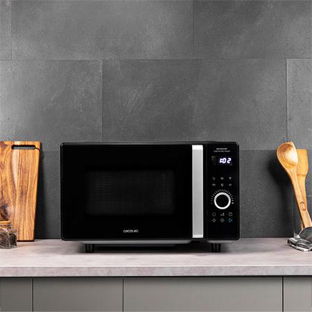 Imagen 2 Microondas digital GrandHeat 2500 Flatbed Touch Black de 25 L y 800 W. Tecnología sin plato para mayor espacio, panel táctil y 8 funciones preconfiguradas.