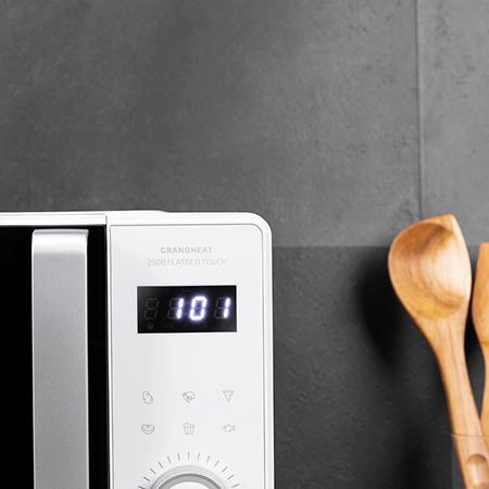 Imagen 3 Microondas digital sin plato Cecotec GrandHeat 2500 Flatbed Touch White de 25L y 800W. Diseño moderno con panel táctil, 8 funciones y tecnología Flatbed.