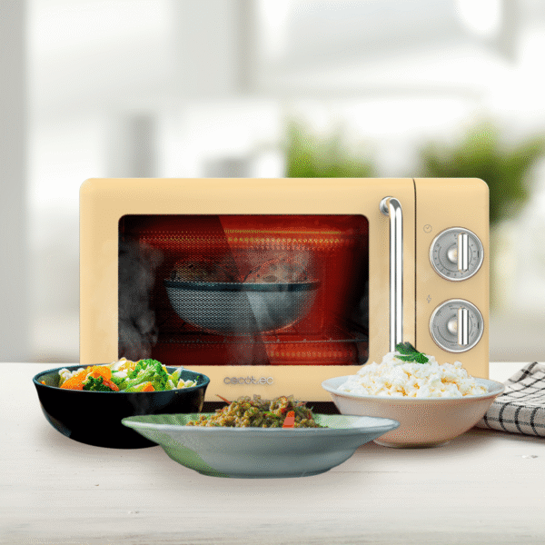 Imagen 6 Aporta un toque vintage a tu cocina con el microondas mecánico Cecotec ProClean 3110 Retro Yellow. Capacidad de 20 litros, 700 W de potencia y grill.