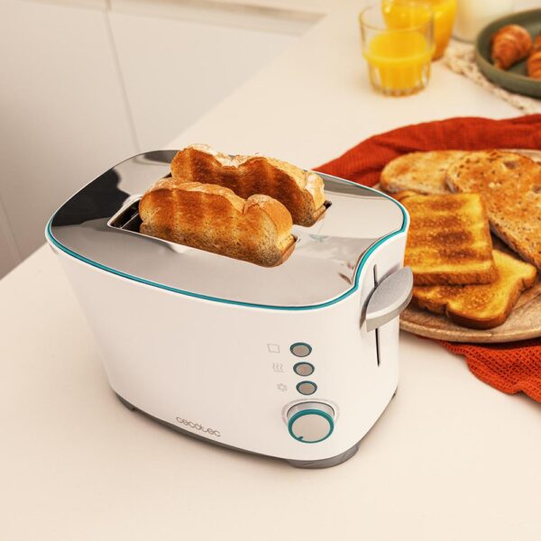 Imagen 5 Tostadora Toast&Taste Double W de 650 W con capacidad para dos tostadas. Incluye 7 niveles de potencia, funciones descongelar y recalentar, y pinzas incluidas.