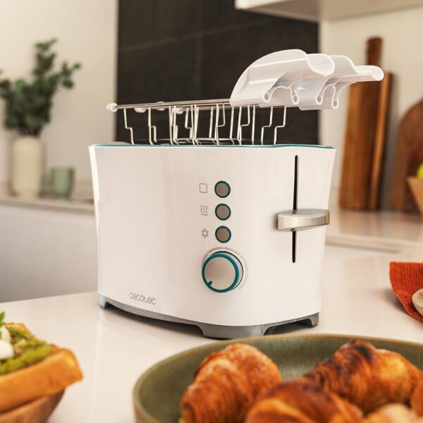 Imagen 7 Tostadora Toast&Taste Double W de 650 W con capacidad para dos tostadas. Incluye 7 niveles de potencia, funciones descongelar y recalentar, y pinzas incluidas.