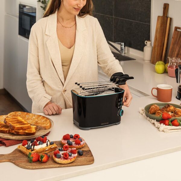 Imagen 7 Tostadora Cecotec Toast&Taste Double B de 650 W para 2 tostadas. Incluye pinzas, 7 niveles de tostado, funciones descongelar, recalentar y bandeja recogemigas.