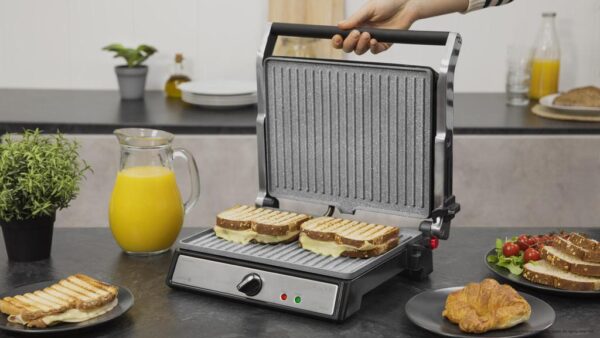 Imagen 3 Parrilla eléctrica de 2400 W con revestimiento RockStone y apertura de 180º. Calentamiento ultrarrápido, placa flotante y superficie antiadherente ecológica.