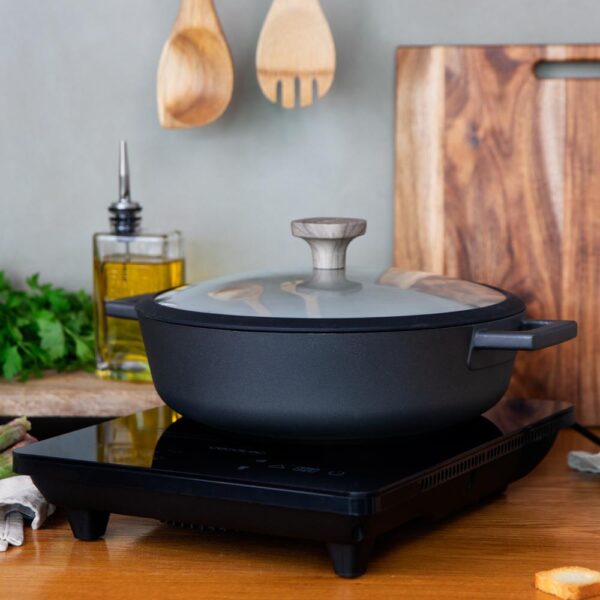 Imagen 4 Placa de inducción portátil Cecotec Full Crystal Onyx de 2000 W con cristal esmaltado, control táctil, 4 programas preconfigurados y temperatura regulable.