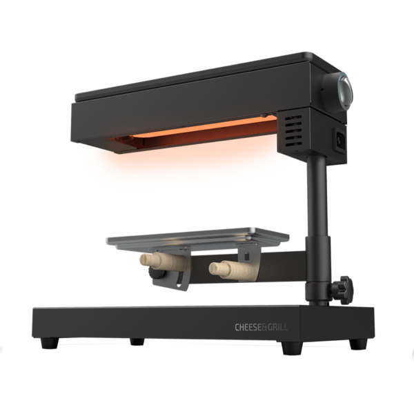 3081-Imagen-2 Imagen 2 Raclette Cheese&Grill 6000 Black de 600 W con función grill y acabados en acero inoxidable. Incluye parrilla antiadherente, termostato regulable y espátulas.