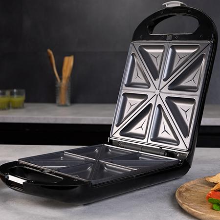 Imagen 5 Sandwichera 3 en 1 de 1500 W con capacidad para 4 sándwiches. Placas intercambiables RockStone para gofres y grill. Cocinado uniforme y limpieza sencilla.