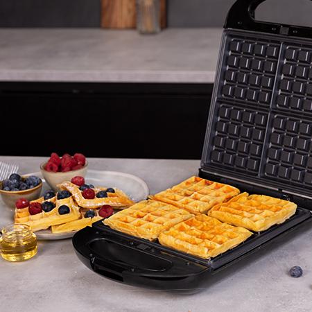 Imagen 6 Sandwichera 3 en 1 de 1500 W con capacidad para 4 sándwiches. Placas intercambiables RockStone para gofres y grill. Cocinado uniforme y limpieza sencilla.