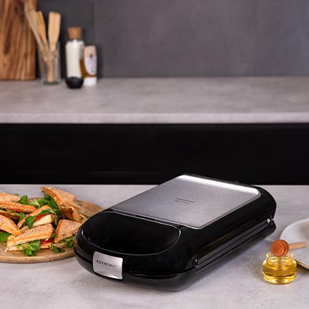 Imagen 7 Sandwichera 3 en 1 de 1500 W con capacidad para 4 sándwiches. Placas intercambiables RockStone para gofres y grill. Cocinado uniforme y limpieza sencilla.