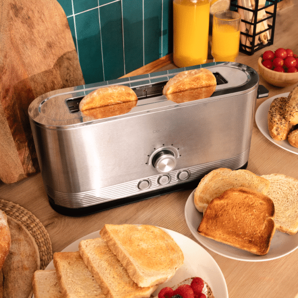 3286-Imagen-6 Imagen 6 Tostadora de acero inoxidable de 1050 W con 2 ranuras anchas de 3,8 cm. Incluye soporte para panecillos, anillo luminoso y sistema de autocentrado.