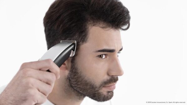 Imagen 4 Cortapelos profesional con cuchillas de titanio, 9 peines guía y palanca de ajuste. Máxima precisión y potencia constante con cable para resultados de peluquería.