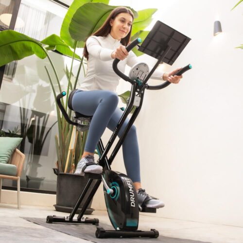 Imagen 2 Bicicleta estática plegable DrumFit X-Cycle 1500 Neo Pro con volante de inercia de 1,5 kg, frenado magnético, sistema Silence Fit y pantalla LCD.