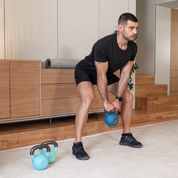 Imagen 3 Pesa rusa DrumFit KettleBell 12000 Neo de 12 kg. Fabricada en hierro fundido con revestimiento de neopreno, agarre ergonómico y diseño fácil de limpiar.