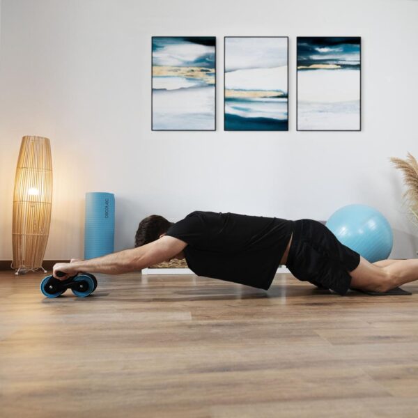 7236-Imagen-4 Imagen 4 Rueda abdominal Drumfit AB Fit de Cecotec con rebote automático. Su diseño compacto de 10 cm de ancho incluye esterilla acolchada. Soporta hasta 100 kg.