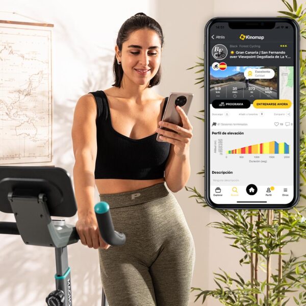 Imagen 4 Bicicleta indoor motorizada con resistencia magnética, volante de 10 kg, pantalla LCD táctil, pulsómetro y conexión APP para un entrenamiento inmersivo.