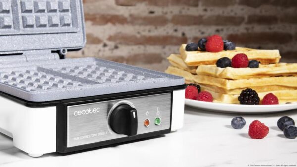 Imagen 6 Gofrera eléctrica de 1200 W con revestimiento RockStone antiadherente. Capacidad para 2 gofres grandes, termostato regulable y material ecológico libre de tóxicos.
