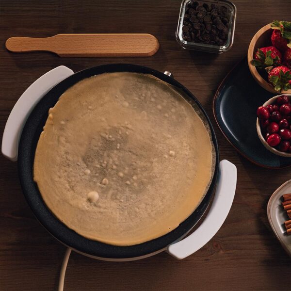 Imagen 7 Crepera eléctrica de 1200 W con placa de 30,5 cm. Revestimiento antiadherente RockStone, potencia regulable y protección contra sobrecalentamiento.