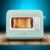 Imagen 6 Tostadora vertical retro verde con ventana de cristal y 700 W. Dispone de 2 ranuras anchas, 5 niveles de tostado y cubierta antipolvo para máxima higiene.
