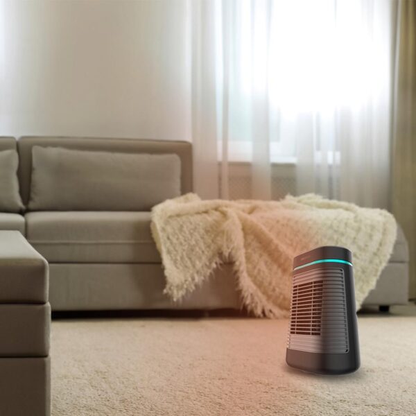 Imagen 6 Calefactor cerámico negro de 1500 W con oscilación y 3 modos. Diseño compacto, tecnología PTC eficiente y triple sistema de seguridad para el hogar.