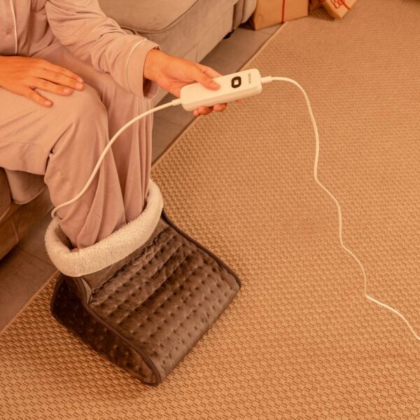 Imagen 3 Manta eléctrica térmica HeatConfort de 200x180 cm en color coral. Cuenta con 9 niveles de temperatura ajustables y sistema de apagado automático seguro.