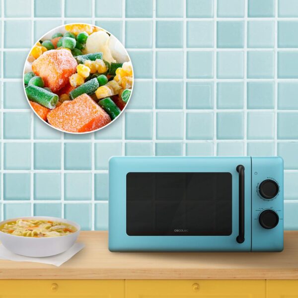Imagen 6 Microondas mecánico Proclean 3010 Blue de Cecotec con 20 litros de capacidad y 700 W. Diseño vintage azul, revestimiento fácil limpieza y modo descongelar.