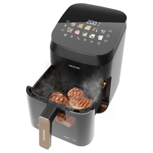 Imagen 2 Freidora de aire 4,5 L y 1900 W con grill y ahumador. Logra sabores a brasa, texturas crujientes y cocciones saludables sin aceite en carnes y verduras.