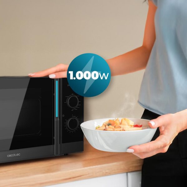 Imagen 6 Microondas mecánico Cecotec ProClean 4120 de 23 litros. Cuenta con 800 W de potencia, grill halógeno de 1000 W y revestimiento interior Ready2Clean.