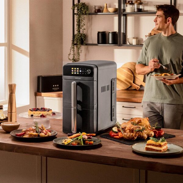 Imagen 4 Freidora de aire de 10 L con diseño vertical y cubetas superpuestas de 5 L. Potencia de 2400 W, control táctil y cocción saludable sin aceite.